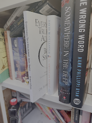 Everything True Has Always Been Simple, the first placed Glimpse book, on a shelf in the field